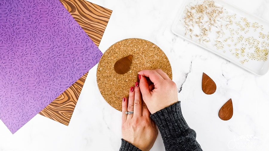 Preparing to make leather teardrop earrings