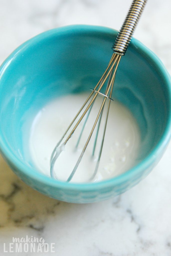 whisking together a homemade all-natural soft scrubbing cleaner 