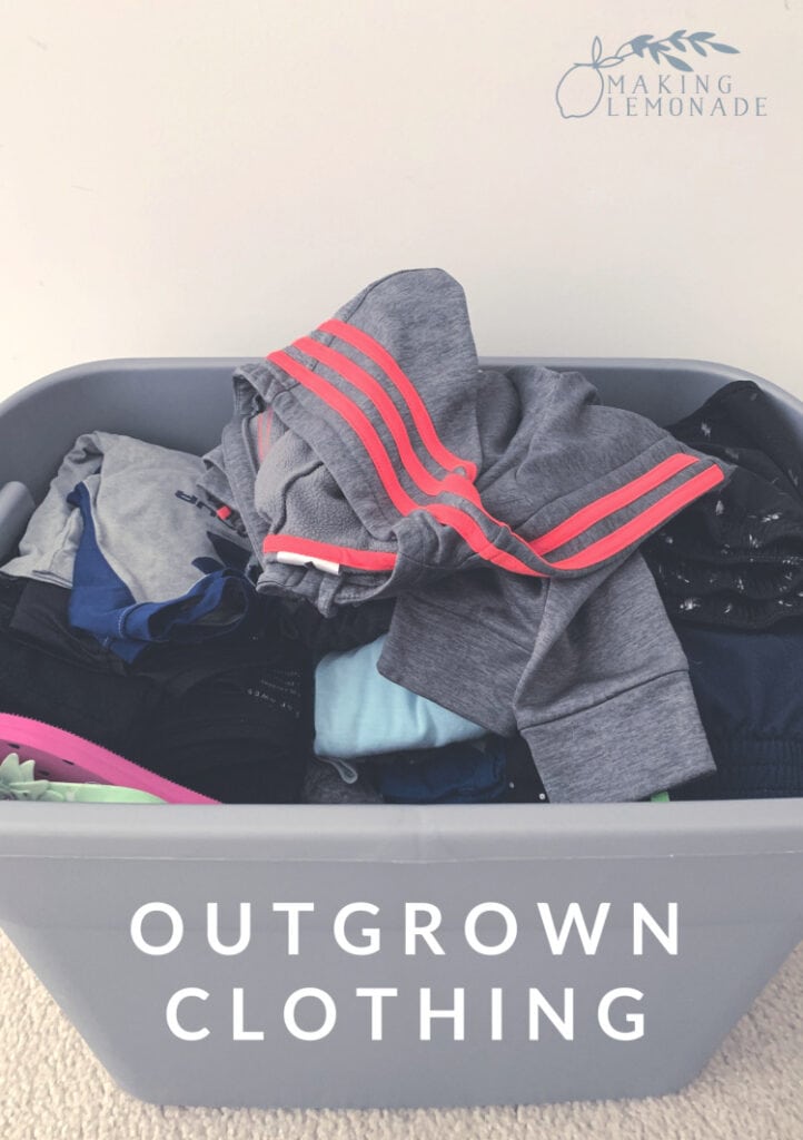 outgrown clothing in a bin