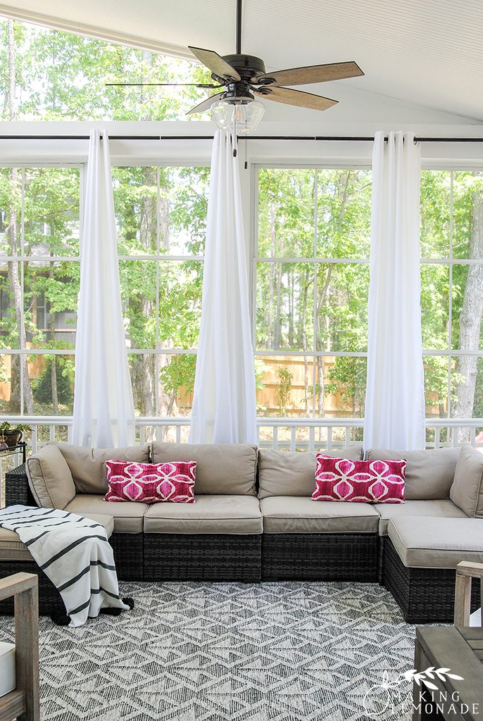 three season porch with outdoor sectional and curtains