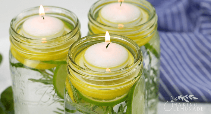 candle floating in mason jar