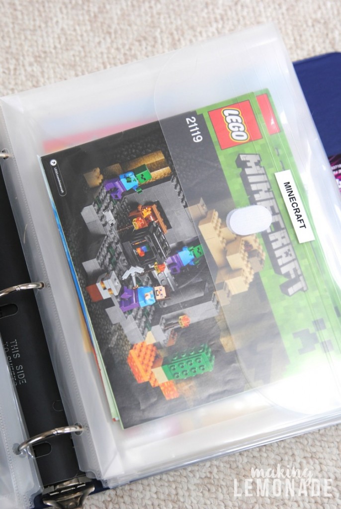 Minecraft LEGO manuals in a binder