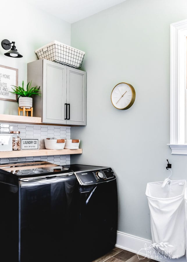 laundry room with hanging laundry bags