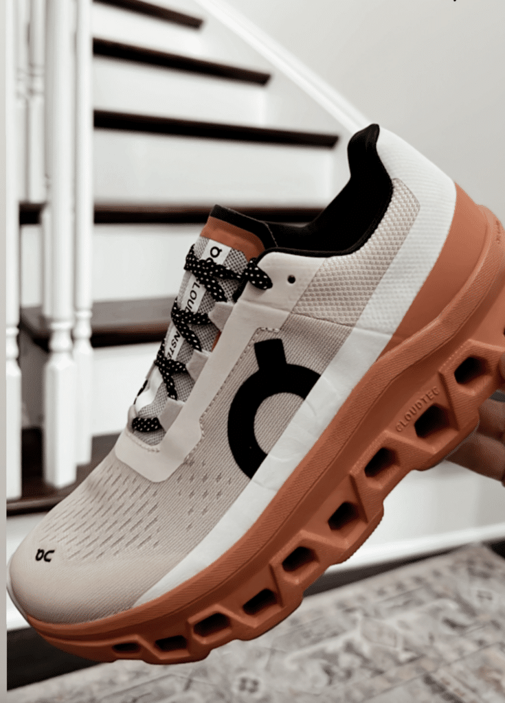 OnCloud sneaker with orange sole