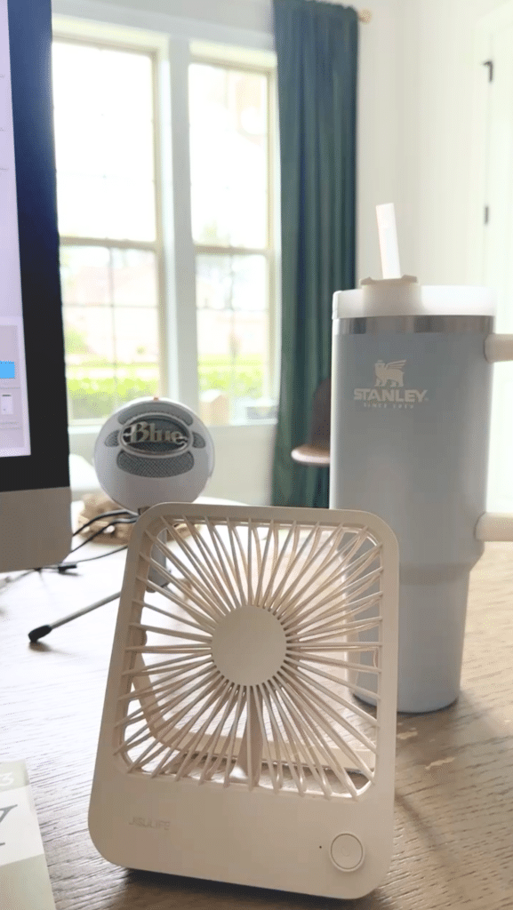 portable travel fan on desk